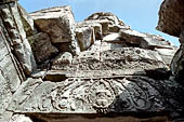 Angkor Thom - Bayon temple, central terrace, corner frontons 